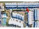 Aerial view showing property location near tennis court at 657 Garland Cir, Indian Rocks Beach, FL 33785