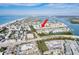 Aerial view showing property's location near beach and waterway at 657 Garland Cir, Indian Rocks Beach, FL 33785