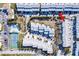 Aerial view highlighting property location near tennis court at 657 Garland Cir, Indian Rocks Beach, FL 33785