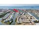 Aerial view showcasing the property's waterfront location and canal views at 657 Garland Cir, Indian Rocks Beach, FL 33785