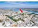 Aerial view showcasing the property's waterfront location and community at 657 Garland Cir, Indian Rocks Beach, FL 33785