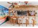 Fun tiki bar with seating and beach-themed decor at 657 Garland Cir, Indian Rocks Beach, FL 33785