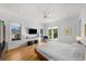 Bright bedroom with hardwood floors and private balcony access at 720 16Th Ne Ave, St Petersburg, FL 33704