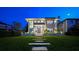 Modern home exterior at night, well-lit and stylish at 720 16Th Ne Ave, St Petersburg, FL 33704