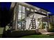 Modern home exterior at night, well-lit and stylish at 720 16Th Ne Ave, St Petersburg, FL 33704