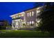 Modern home exterior at night, well-lit and stylish at 720 16Th Ne Ave, St Petersburg, FL 33704