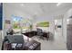 Spacious home office with large windows and wood desk at 720 16Th Ne Ave, St Petersburg, FL 33704