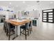 Modern kitchen with stainless steel appliances and a large island at 720 16Th Ne Ave, St Petersburg, FL 33704