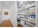 Well-organized linen closet with ample shelving for storage at 720 16Th Ne Ave, St Petersburg, FL 33704