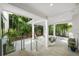Relaxing outdoor patio with seating area and lush landscaping at 720 16Th Ne Ave, St Petersburg, FL 33704