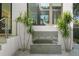 Tranquil water feature with three spouts and landscaping at 720 16Th Ne Ave, St Petersburg, FL 33704