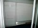 Small balcony with roll-down shutters at 946 Virginia St # 102, Dunedin, FL 34698