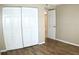 Bright bedroom featuring ample closet space and tile flooring at 946 Virginia St # 102, Dunedin, FL 34698