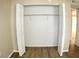 Open double-door closet with wire shelving at 946 Virginia St # 102, Dunedin, FL 34698