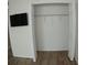 Spacious walk-in closet with wire shelving and neutral walls at 946 Virginia St # 102, Dunedin, FL 34698