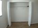 Bright walk-in closet with wire shelving and neutral walls at 946 Virginia St # 102, Dunedin, FL 34698