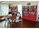 Community library with bookshelves and seating area at 946 Virginia St # 102, Dunedin, FL 34698