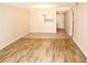 Bright dining area with tile flooring and view to living room at 946 Virginia St # 102, Dunedin, FL 34698