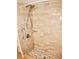 Walk-in shower with beige tile and hexagonal floor tile at 946 Virginia St # 102, Dunedin, FL 34698