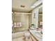 Bathroom with bathtub, shower, and a vanity at 1040 Bowsprit Ln # 1306, Holiday, FL 34691