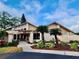 Community building with welcoming entrance at 1040 Bowsprit Ln # 1306, Holiday, FL 34691