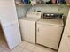 Laundry closet with washer and dryer at 1040 Bowsprit Ln # 1306, Holiday, FL 34691