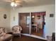 Sunroom with wicker furniture and view of dining area at 1040 Bowsprit Ln # 1306, Holiday, FL 34691