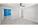 Bedroom with mirrored closet and ceiling fan at 1204 Dartmouth Dr, Bradenton, FL 34207