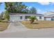Cute ranch home with driveway and small front yard at 1204 Dartmouth Dr, Bradenton, FL 34207