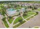 Aerial view of community pool, clubhouse, and homes at 12332 Prairie Valley Ln, Riverview, FL 33579