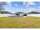 Large backyard with pool and grassy area at 12332 Prairie Valley Ln, Riverview, FL 33579