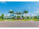 Community center with palm trees and attractive landscaping at 12332 Prairie Valley Ln, Riverview, FL 33579