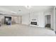 Open concept living room with kitchen and pool view at 12332 Prairie Valley Ln, Riverview, FL 33579