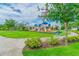 Bright blue playground in a community park at 12332 Prairie Valley Ln, Riverview, FL 33579