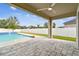 Spacious pool area with a large patio and a tranquil atmosphere at 12332 Prairie Valley Ln, Riverview, FL 33579