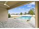 View of the refreshing pool and patio from covered patio at 12332 Prairie Valley Ln, Riverview, FL 33579