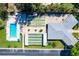 Aerial view showing pool, shuffleboard, and bocce ball courts at 12400 Park Blvd # 206, Seminole, FL 33772