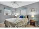 Comfortable bedroom with carpeted floor and ceiling fan at 12400 Park Blvd # 206, Seminole, FL 33772