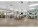 Community room with tables and chairs at 12400 Park Blvd # 206, Seminole, FL 33772