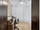 Small office space with a desk, chair, and neutral decor at 12400 Park Blvd # 206, Seminole, FL 33772