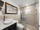 Modern bathroom with a walk-in shower and stylish vanity at 12632 Oak Hollow Ct, Dade City, FL 33525