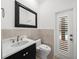 Modern bathroom with updated fixtures and a frameless glass shower at 12632 Oak Hollow Ct, Dade City, FL 33525