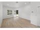 Bedroom with sliding glass doors leading to the backyard and pool at 12632 Oak Hollow Ct, Dade City, FL 33525