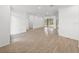 Spacious living area with hardwood floors and pool access at 12632 Oak Hollow Ct, Dade City, FL 33525