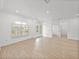 Bright and airy living room with hardwood floors at 12632 Oak Hollow Ct, Dade City, FL 33525