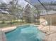 Screened in pool and patio area at 12632 Oak Hollow Ct, Dade City, FL 33525