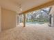 Enclosed pool and patio area with a view at 12632 Oak Hollow Ct, Dade City, FL 33525