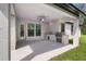 Covered patio features a built-in grill and sink at 13458 Haflinger Way, Hudson, FL 34667