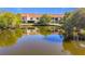 Community with lake and lush landscaping at 13600 Egret Blvd # 204K, Clearwater, FL 33762