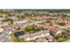 Community overview with pond and homes at 13600 Egret Blvd # 204K, Clearwater, FL 33762